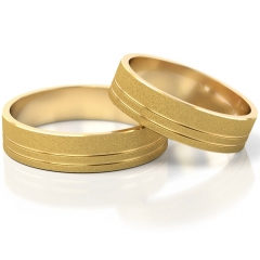 Płaskie zdobione złote obrączki ślubne próby 585